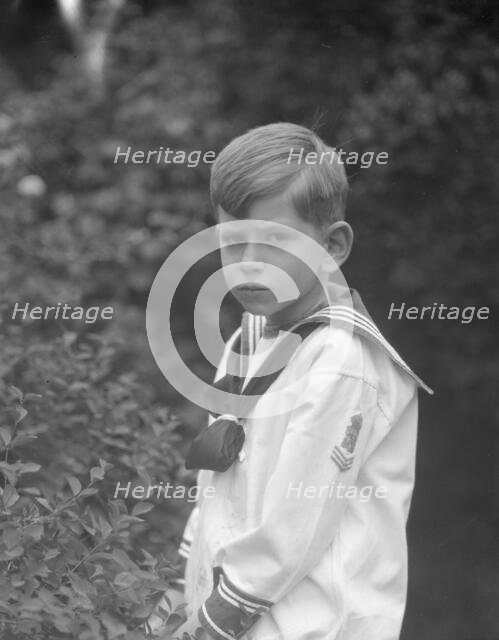 McCormick, Medill, child of, standing outdoors, 1923 May 21. Creator: Arnold Genthe.