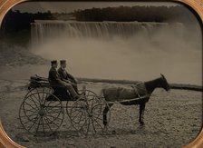 Two Men Seated in a Horse-Drawn Carriage in Front of Niagara Falls, 1860s. Creator: Unknown.