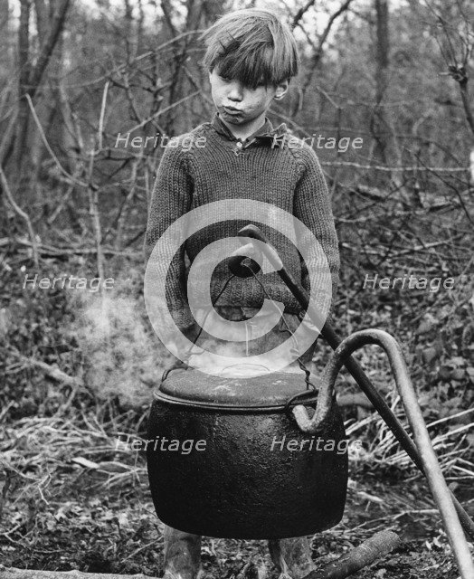 Gypsy boy with cauldron, 1960s.