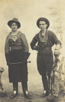 British prisoners of war in cowboy and cowgirl costumes posing at...(1910 - 1919?). Creator: Paul Tharan.