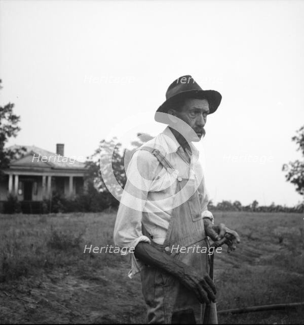 Tenant farmer near Thomaston, Georgia, speaking of the drought, 1936. Creator: Dorothea Lange.