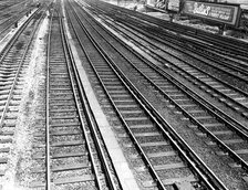 Railway tracks and Butlin's advertisement, c1955. Creator: Arthur Charles Kirby Ware.