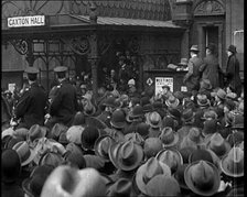 A Large Group of Civilians and Two Uniformed Males on Horse Back Outside Caxton Hall, 1924. Creator: British Pathe Ltd.