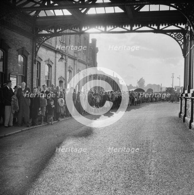 Bournemouth train station during an outing of Laing's London office to Bournemouth, Hampshire, 1953. Creator: John Laing plc.