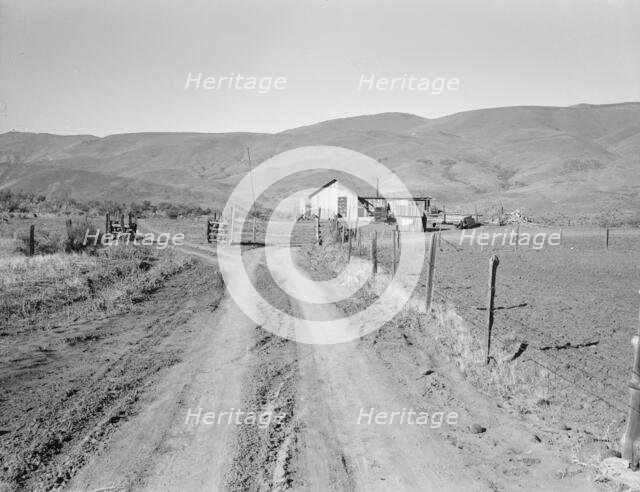 A new house for descendant of old Idaho...Ola self-help sawmill co-op, Gem County, Idaho, 1939. Creator: Dorothea Lange.