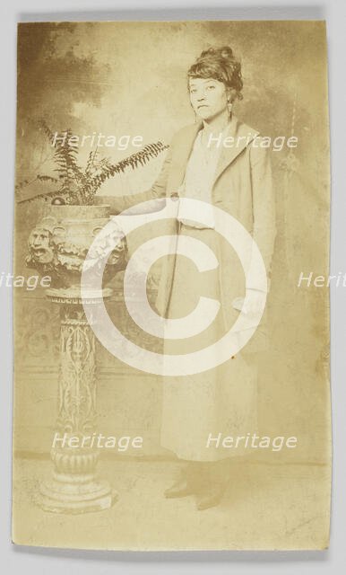 Photographic postcard of a woman, 1918-1930. Creator: The Rex Photo Studio.