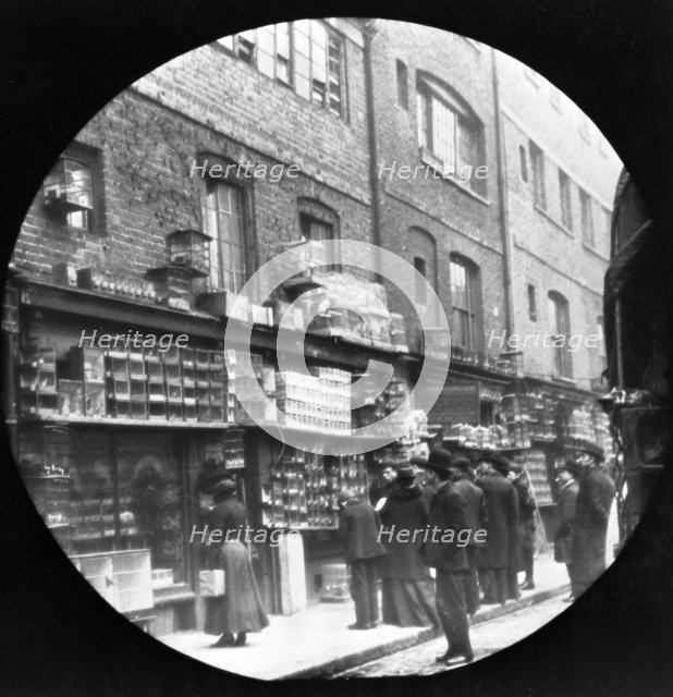 Sunday bird fair, Sclater Street, off Brick Lane, London, c1900. Artist: John Galt