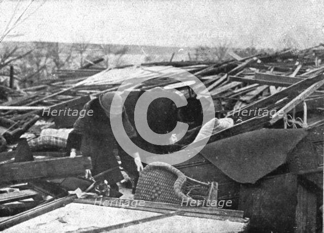 In Canada: The Halifax Explosion; People search among the ruins of their houses, 1917. Creator: Unknown.
