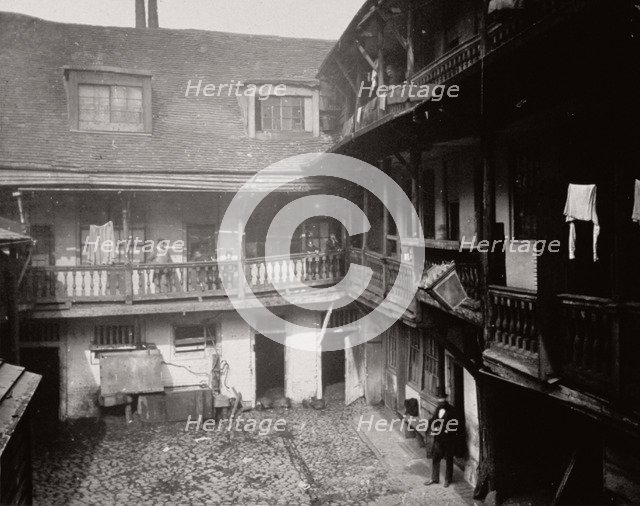 Courtyard at the Oxford Arms Inn, Warwick Lane, from the first floor, City of London, 1875. Artist: Society for Photographing the Relics of Old London