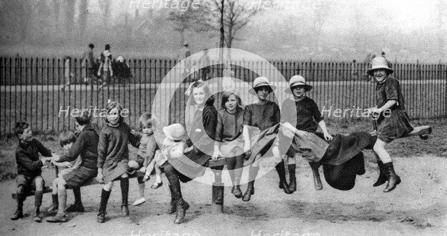 Children in a park, London, 1926-1927. Artist: Unknown