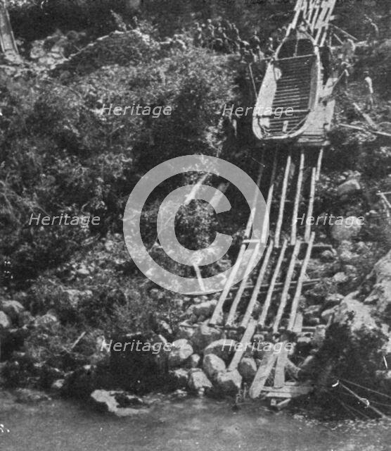 Italian Offensive of the Isonzo; Boats are lowered on a slide of the riverbank escarpment, 1917. Creator: Unknown.