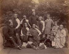 Formal Family Portrait of Thirteen People, Men in European Dress, 1860s-70s. Creator: Unknown.