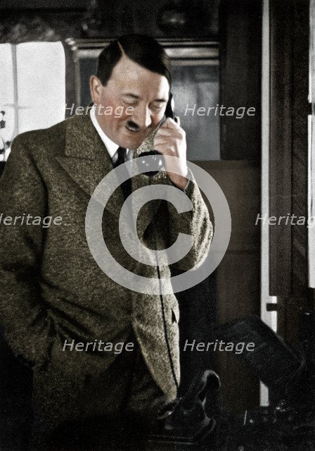 Adolf Hitler on the telephone, January 1935. Artist: Unknown.