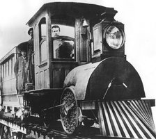 American inventor Thomas Alva Edison on board an electric railroad, 1892. Artist: Unknown
