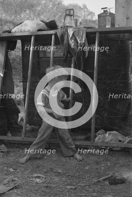 Son of destitute migrant, American River camp, near Sacramento, California, 1936. Creator: Dorothea Lange.
