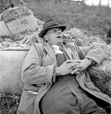 Man asleep, Royal Agricultural Show, Newcastle upon Tyne , c1946-c1959. Artist: John Gay