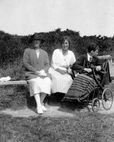 A physically disabled boy sitting in a wheelchair,  c1910/1925. Creator: Unknown.