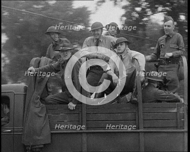 US Army Trucks and Cars Lining the Road, 1932. Creator: British Pathe Ltd.