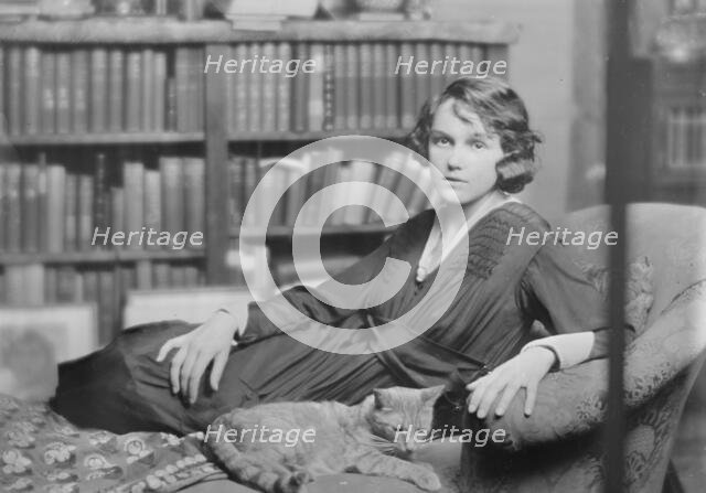 Miss Helen Chamberlain, with Buzzer the cat, portrait photograph, 1918 May 28. Creator: Arnold Genthe.