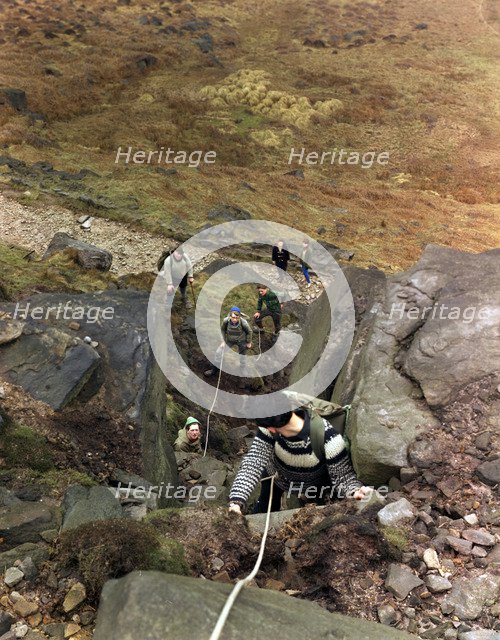 Climbers on Stanage Edge, Hathersage, Derbyshire, 1964.  Artist: Michael Walters