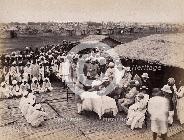 Discharged hospital patients after bubonic plague outbreak, being given relief money..., 1897. Creator: Unknown.