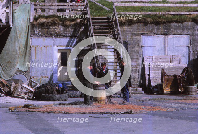 Fishermen in Husavik, Iceland, 20th century. Artist: CM Dixon.