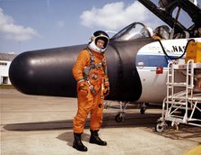 NASA astronaut with experimental airplane, 1979. Creator: NASA.