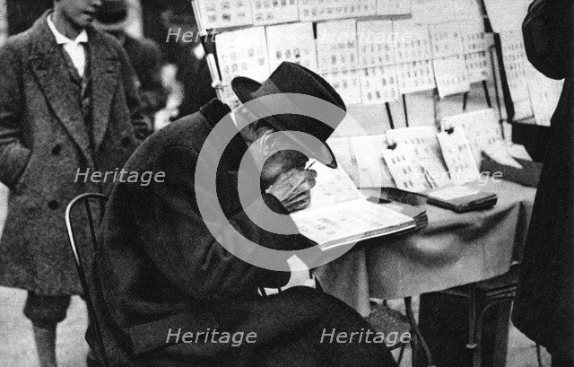 An old purchaser of stamps, Paris, 1931.Artist: Ernest Flammarion