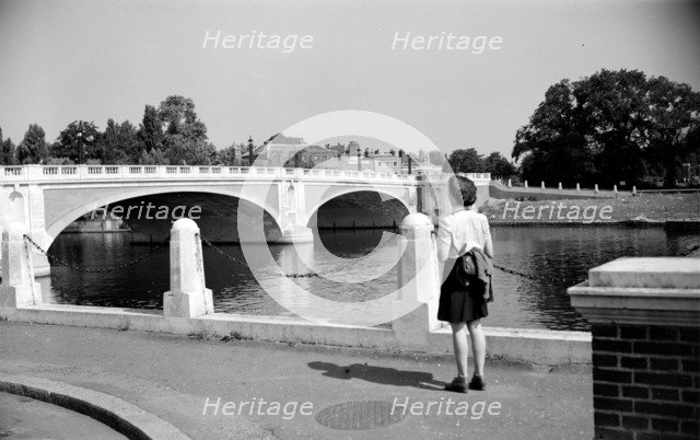 Woman admiring Hampton Court Bridge, London, c1945-c1965. Artist: SW Rawlings