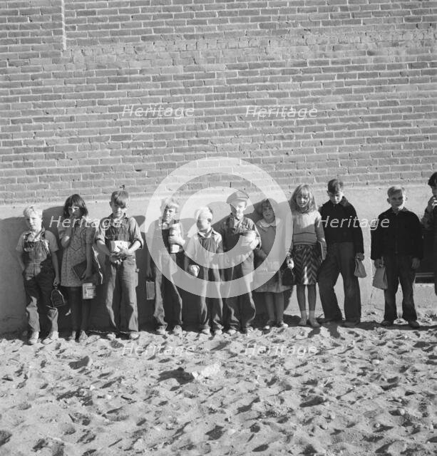 The children from Dead Ox Flat ready to march into the school..., Malheur County, Oregon, 1939. Creator: Dorothea Lange.