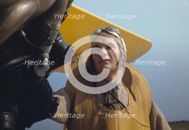 Marine lieutenant by the power towing plane for the gliders at Page Field, Parris Island, S.C., 1942 Creator: Alfred T Palmer.