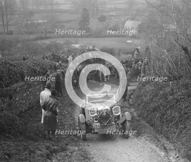 Lagonda of WM Couper performing a braking test, MCC Exeter Trial, Ibberton Hill, Dorset, 1930. Artist: Bill Brunell.