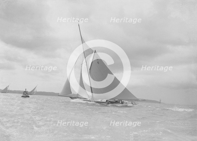 The spectacular 15 Metre 'Vanity' sailing in a good wind, 1912. Creator: Kirk & Sons of Cowes.