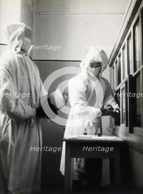 The inoculation of an isolated plague patient in China, c20th century. Creator: Unknown.