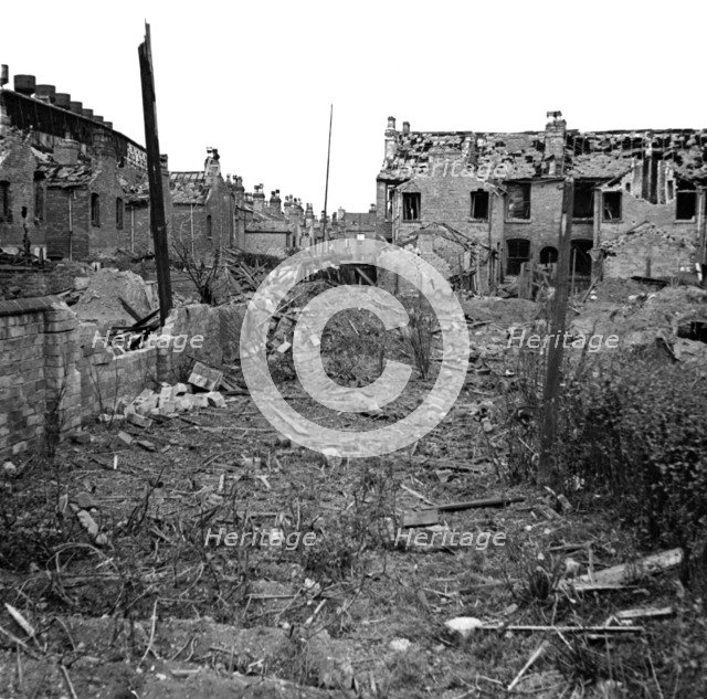 Wartime bomb damage, Long Acre, Nechells, Birmingham, West Midlands, World War II, 29 July 1942. Artist: James Nelson.