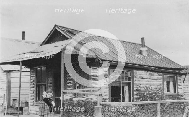 Log cabin, between c1900 and 1916. Creator: Unknown.