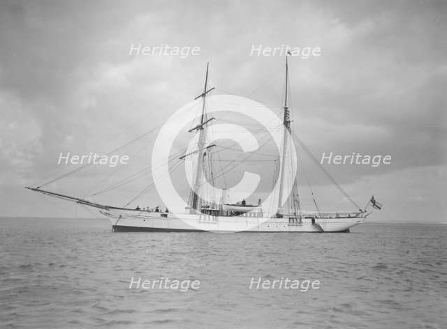 The schooner 'Francisca' at anchor, 1911. Creator: Kirk & Sons of Cowes.