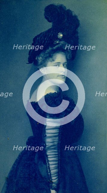 Miss Mary Olmsted(?) Clarke, half-length portrait, standing, facing right, c1903. Creator: Frances Benjamin Johnston.