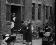 Female Civilians and Their Babies at Health Clinics Where the Babies Are Checked by Female..., 1931. Creator: British Pathe Ltd.