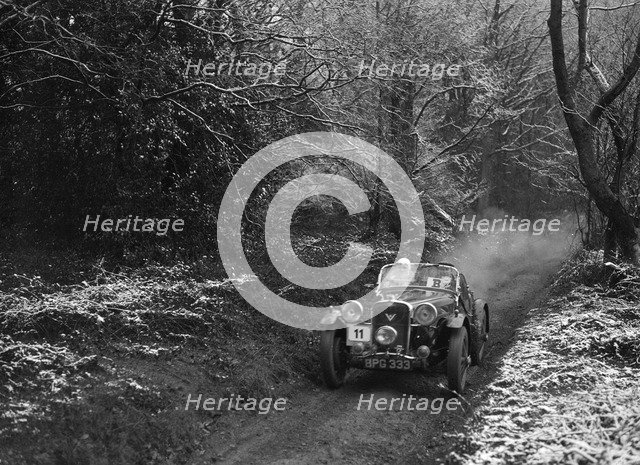 1934 Singer Le Mans taking part in a motoring trial, late 1930s. Artist: Bill Brunell.
