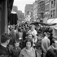 Middlesex Street, part of Petticoat Lane Market, Whitechapel, London, c1946-c1959. Creator: John Gay.