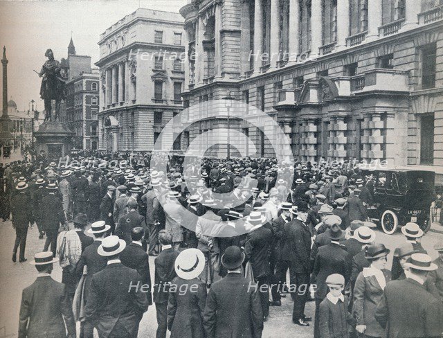 Crowd waiting outside the War Office on the morning before war was declared', 1914. Artist: Unknown