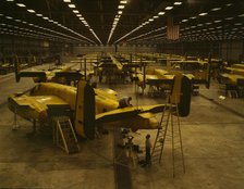 Assembling B-25 bombers at North American Aviation, Kansas City, Kansas, 1942. Creator: Alfred T Palmer.