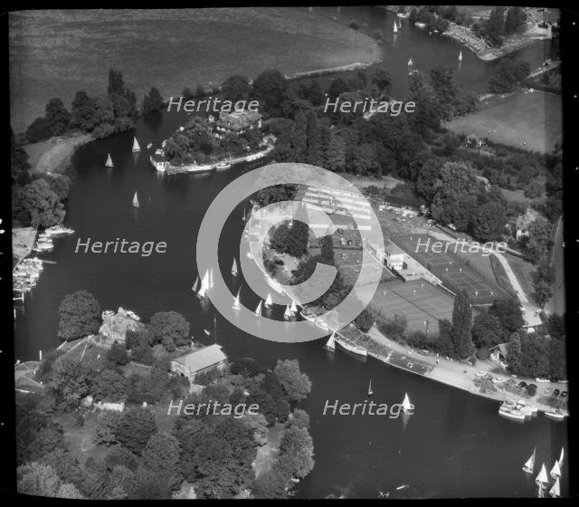 Sailing boats on the River Thames and Weybridge Tennis Club, Weybridge, Surrey, 1959.  Creator: Aerofilms.