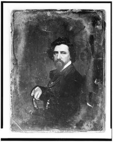 Thomas Hicks, half-length portrait, body in profile to left, facing front, between 1844 and 1860. Creator: Mathew Brady.