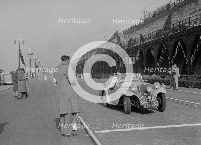 Singer Nine sports of CE Cole at the RAC Rally, Madeira Drive, Brighton, 1939. Artist: Bill Brunell.