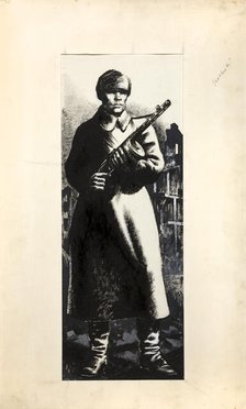 Russian infantryman, standing amidst ruins of town, between 1939 and 1946. Creators: Central Office of Information, Unknown.