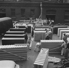 Possibly: United States government workers and carpenters making crates..., Washington, D.C., 1942. Creator: Gordon Parks.