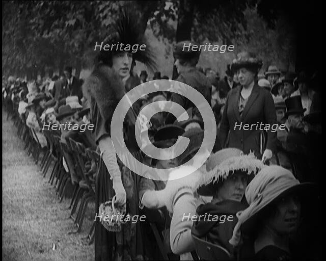 Smartly Dressed Civilians Sitting in Chairs , 1924. Creator: British Pathe Ltd.