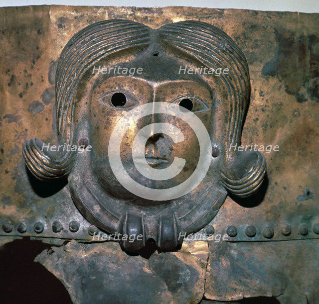 Detail of a bronze cauldron showing a human head wearing a Celtic torc, 4th century BC. Artist: Unknown